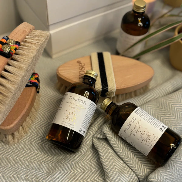 Organic body oils dnd dry body brushes with different handles on display