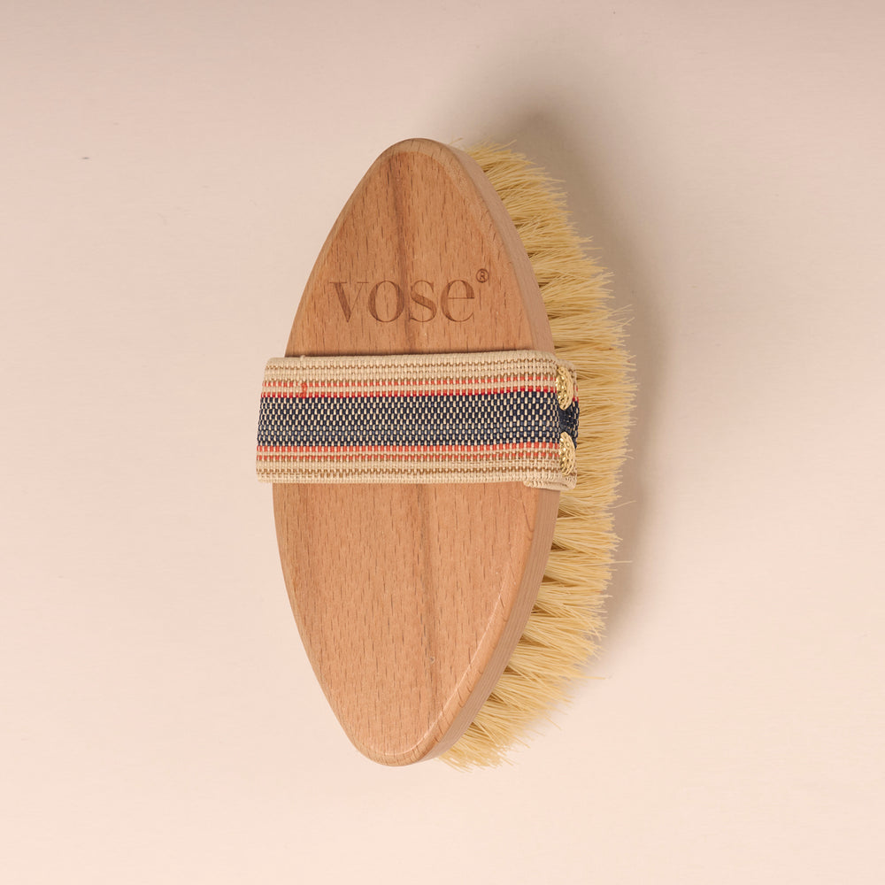 1000 Vose Cactus Bristle Vegan Body Brush on a pastel background