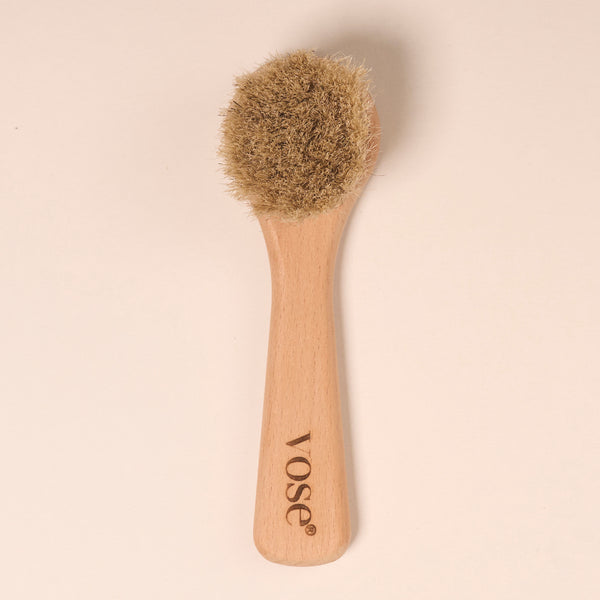 Natural and organic horse hair face brush with wooden handle on display