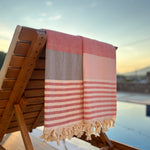 stripy turkish towel by the pool