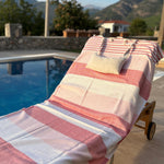 stripy turkish towel by the pool